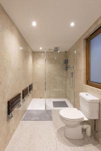 Et badeværelse på Pool House at Mill Cottage