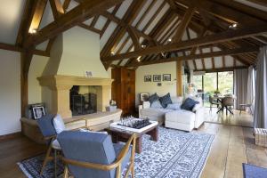 Et opholdsområde på Pool House at Mill Cottage