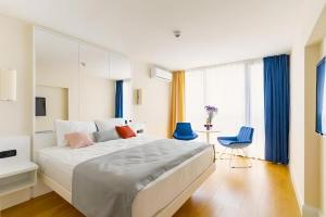 Ένα ή περισσότερα κρεβάτια σε δωμάτιο στο Orbi City Batumi D1 Block +25 φωτογραφίες