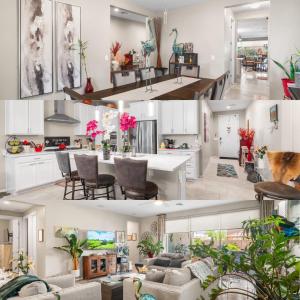 a kitchen and living room with white cabinets at Goodyear Retreat Pool Slide Firepit BBQ in Perryville