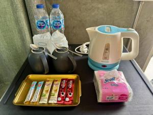 a tray with a blender and some drinks on a table at The Poom Garden Khao Yai in Ban Khanong Phra Klang (1) +7 photos