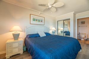 Ένα ή περισσότερα κρεβάτια σε δωμάτιο στο GSP3 Summer Breeze Oceanfront Condo, Elevator, Pool, Fitness Club! +34 φωτογραφίες