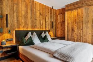 Ένα ή περισσότερα κρεβάτια σε δωμάτιο στο Chalet L Piz Dolomites +26 φωτογραφίες