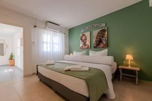 Giường trong phòng chung tại Casa Hibiscus +42 ảnh