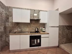 Kuchyň nebo kuchyňský kout v ubytování Il Canto della fontana + 11 fotografií