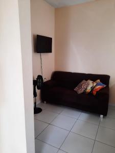 Μια τηλεόραση ή/και κέντρο ψυχαγωγίας στο Estúdio acolhedor e versátil +8 φωτογραφίες