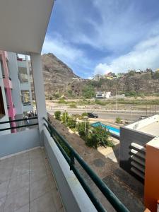 a balcony with a view of a pool at Apartamento Rua de Horta in Ribeira Grande