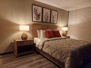 Postel nebo postele na pokoji v ubytování Refugio de lujo con vista a la cordillera central