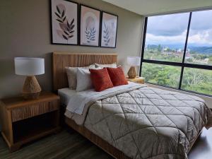 Postel nebo postele na pokoji v ubytování Refugio de lujo con vista a la cordillera central