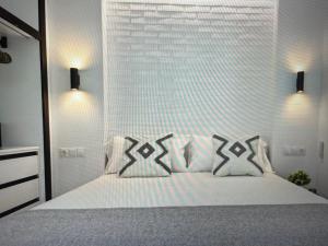 Ένα ή περισσότερα κρεβάτια σε δωμάτιο στο Boutique apt& sea view