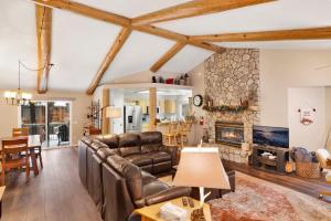 a living room with a couch and a fireplace at Castle Glen Gem #2220 in Big Bear Lake