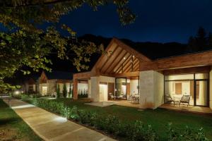 a home at night with the lights on at Terra Homes in Kolašin