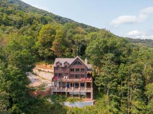an aerial view of a house in the woods at Cranberry View Lodge in Newland