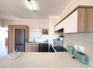 Η κουζίνα ή μικρή κουζίνα στο Sunset & Soul