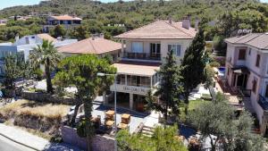 an aerial view of a house in a city at Sefa Çamlı Palas in Ayvalık