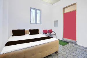 Ένα ή περισσότερα κρεβάτια σε δωμάτιο στο SPOT ON Hotel Vs Palace