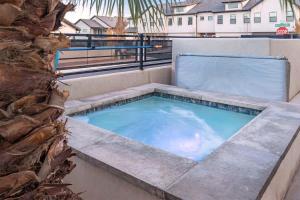 a hot tub on the roof of a building at 31| Pool Palace in St George with Snow Canyon View in Santa Clara