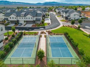 an aerial view of tennis courts in a residential neighborhood at 31| Pool Palace in St George with Snow Canyon View in Santa Clara