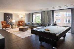 a large living room with a pool table in it at Hyatt Regency San Antonio Riverwalk in San Antonio