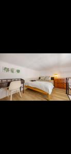 Postel nebo postele na pokoji v ubytování Uhome City Park