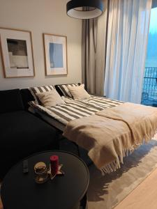 Postel nebo postele na pokoji v ubytování Levi Fjällen 6