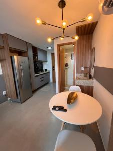 Η κουζίνα ή μικρή κουζίνα στο Beira-Mar Flat Sonne