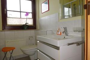 Koupelna v ubytování Apartment Bergblick + 22 fotografií