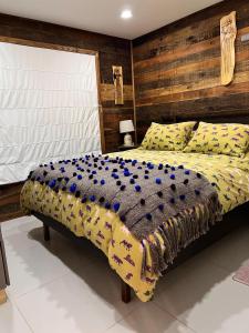 Postel nebo postele na pokoji v ubytování Cabañas Laguna Magica