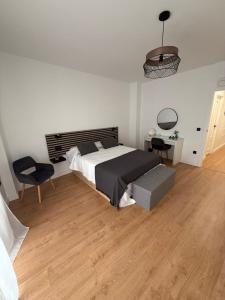 Voodi või voodid majutusasutuse Apartamento Montemar en el centro de Baeza toas +7 fotot