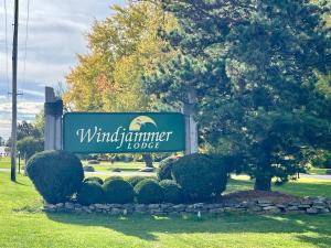 a sign for a windhamiter lodge in a park at Windjammer Lodge in Ogdensburg