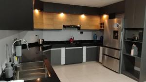 Una cocina o cocineta en Sibauty Suites
