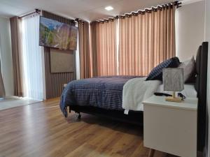Una cama o camas en una habitación de Sibauty Suites