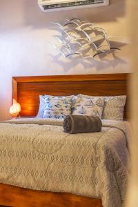 Ένα ή περισσότερα κρεβάτια σε δωμάτιο στο Habitacion privada a unos pasos de la playa - 1