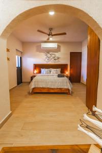 Ένα ή περισσότερα κρεβάτια σε δωμάτιο στο Comoda habitacion a unos pasos de la playa - 2