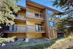an exterior view of a building with balconies at Beaverhead 1421 in Big Sky