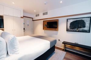 Μια τηλεόραση ή/και κέντρο ψυχαγωγίας στο Leicester House Hotel