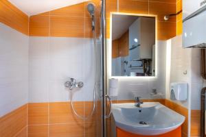 Koupelna v ubytování Vijećnica Loft Apartment + 17 fotografií