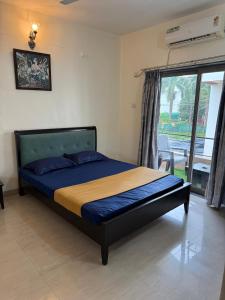 Postel nebo postele na pokoji v ubytování Golden Maple Villa + 8 fotografií