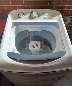 a washing machine sitting on top of a sink at Casa de Temporada Ceu e Mar in Praia do Bananal +27 photos