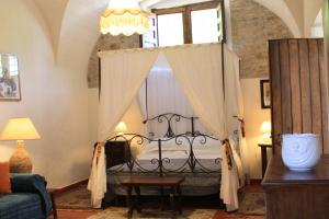 Postel nebo postele na pokoji v ubytování Agriturismo Ridocco