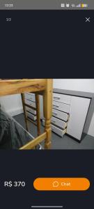 a picture of a table with a desk at Pousada El Shaday compartilhada in Barueri