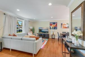 a living room with a couch and a table at Entire Home in Lanham MD in Lanham