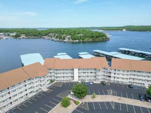 an aerial view of a large apartment complex with a lake at Experience Lakeside Living at Its Finest: Stunning Views and Prime Location! in Laguna Beach