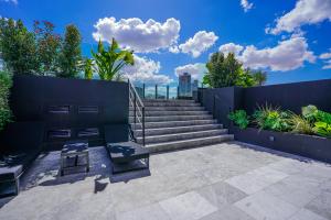 a set of concrete stairs with a set of stairs at Foster Studio - Park 3 in Buenos Aires