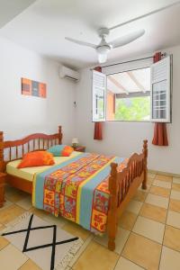 Giường trong phòng chung tại T2 confort avec terrasse et jardin