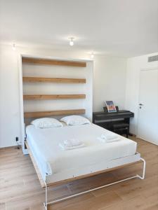 Postel nebo postele na pokoji v ubytování Seaside Azur