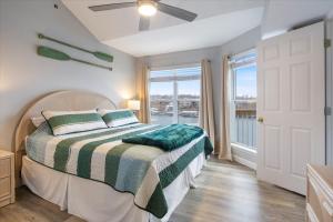 a bedroom with a bed and a large window at Family-Perfect Lakefront Fun at The Ledges, 21mm, 2 Pools & Beach in Laguna Beach +38 photos