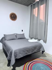 Postel nebo postele na pokoji v ubytování Casa Xolo Coco