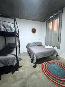 Postel nebo postele na pokoji v ubytování Casa Xolo Coco