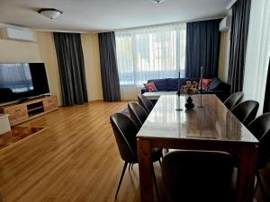 TV a/nebo společenská místnost v ubytování Elit Pamporovo Accommodation